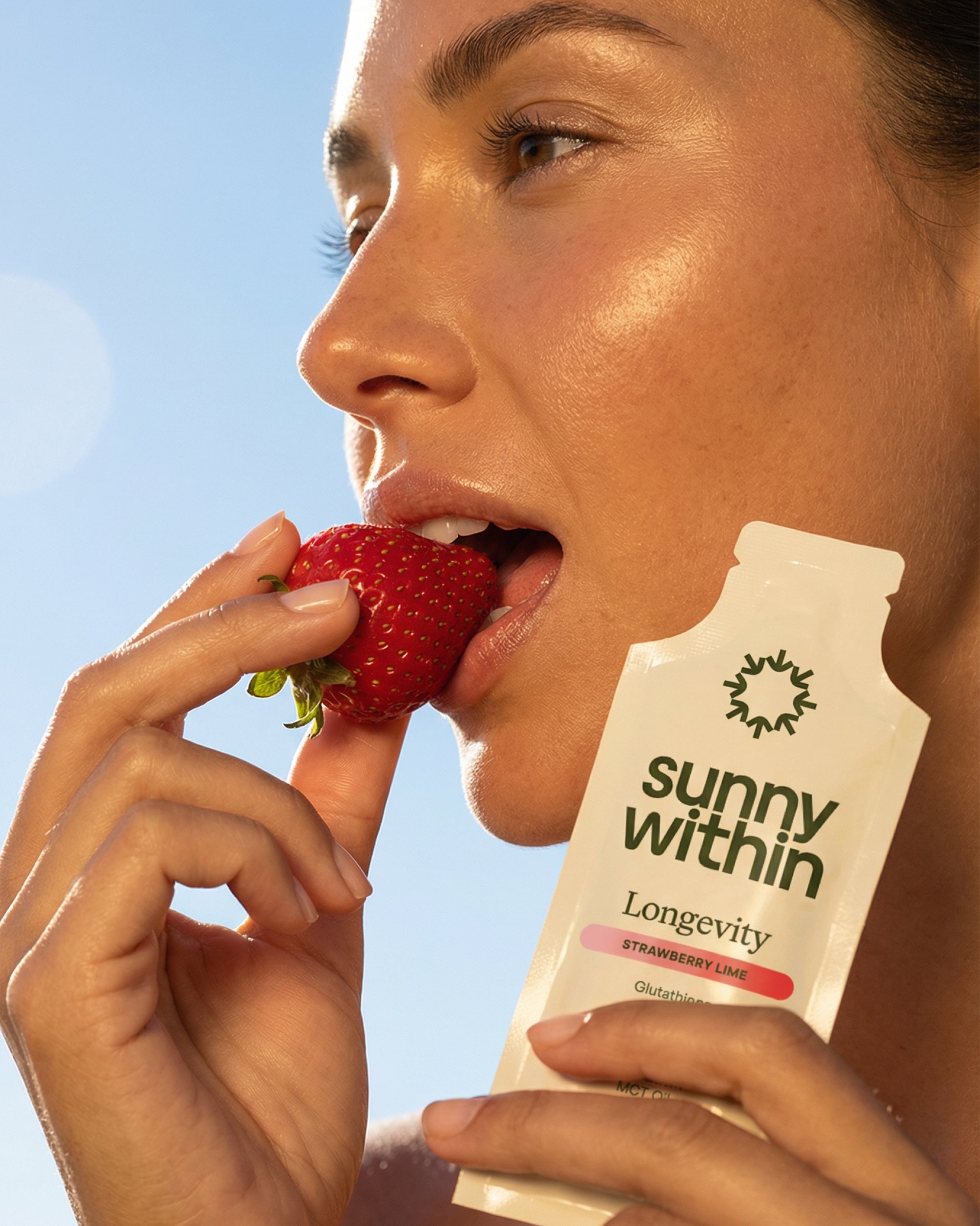 PDP Longevity Strawberry Supplement - Happy Woman with Radiant Skin - Energizes and Nourishes from Within.