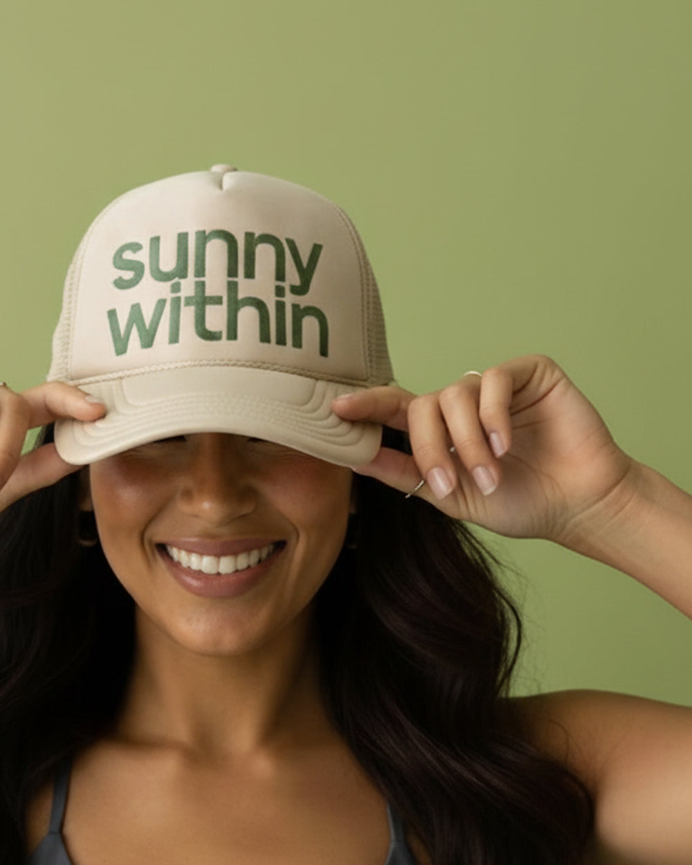 Gemini liposomal supplement - Joyful person in a visor cap - Fuels radiant energy and longevity.