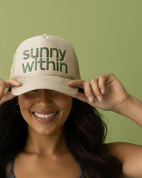 Gemini liposomal supplement - Joyful person in a visor cap - Fuels radiant energy and longevity.