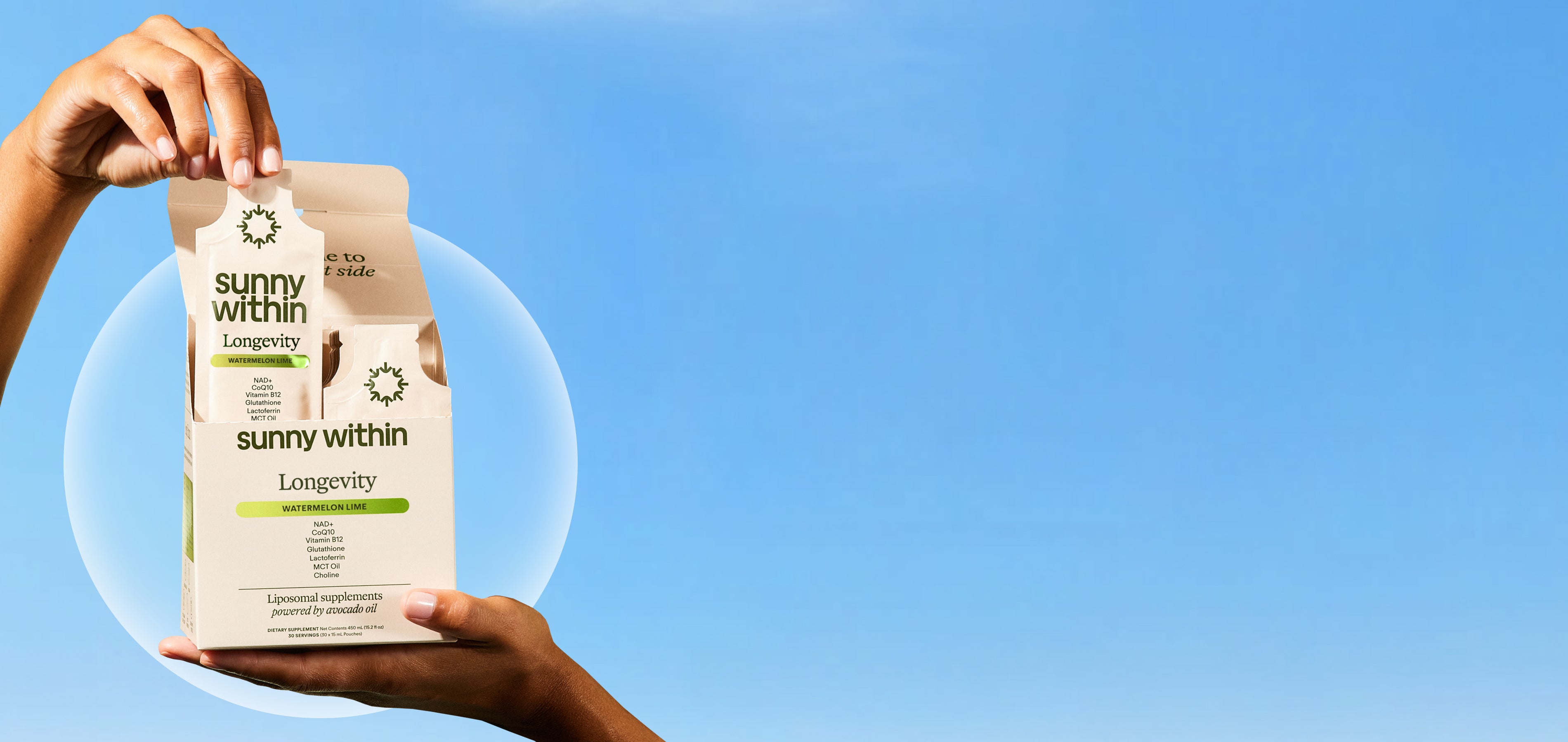Person holding a 'sunny within' package against a blue background